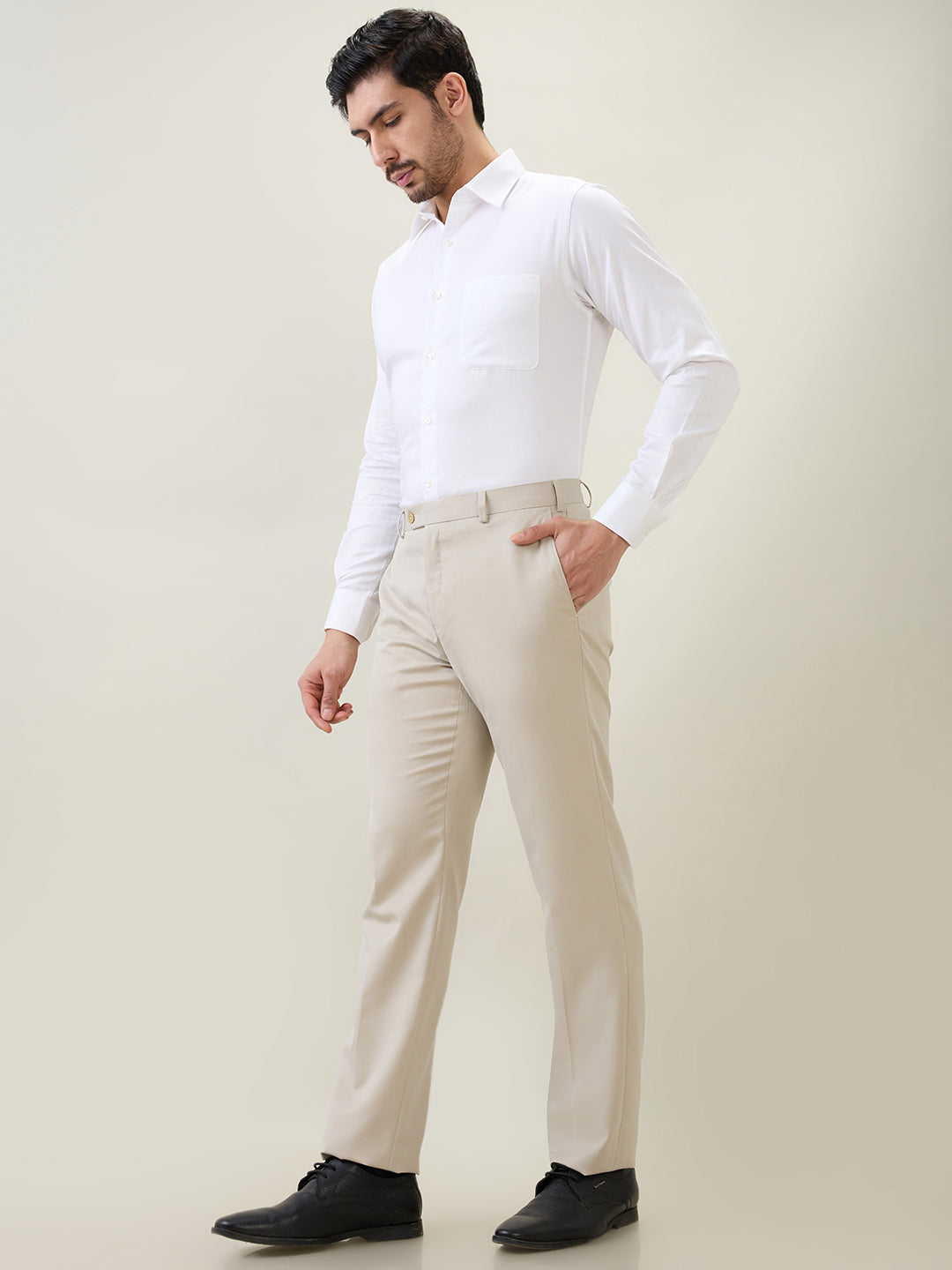 Raymond Men Brown Solid Contemporary Fit Polyester Blend Trouser