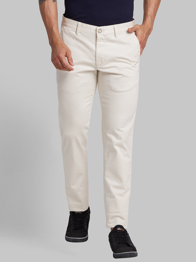 Parx Beige Solid Low Rise Tapered Fit Cotton Blend Trouser